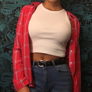 A flannel shirt with an allover plaid pattern.